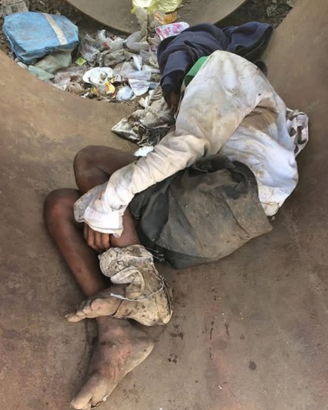 Homeless Elderly Sleeping on Footpath